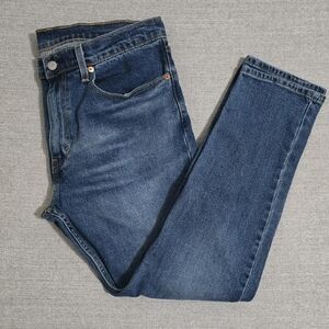Levi's medium wash tapered blue jeans